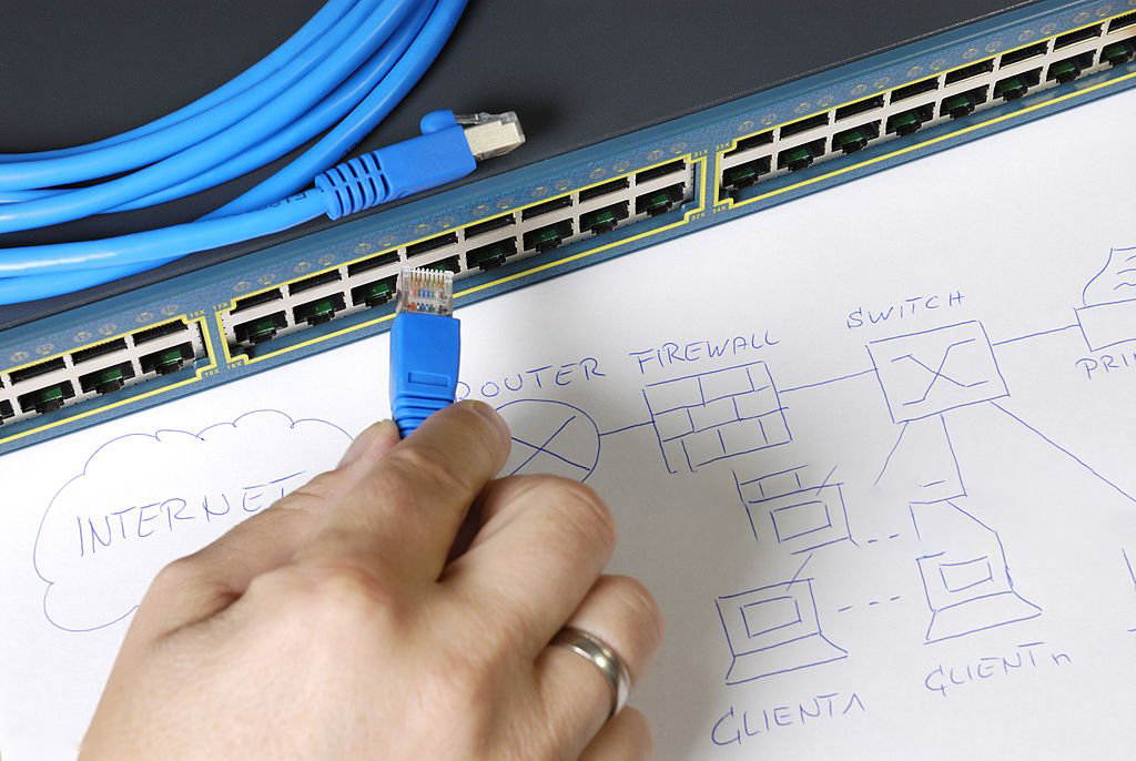 Engineer is planning and building up a computer network.computer and computer network